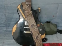 Гитарный ремень из кожи питона с карманом для медиатора и кончо